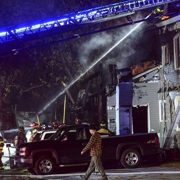 Plane crashes into New Hampshire building; all on board die